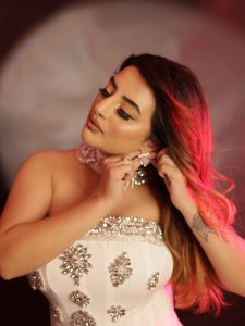 Ankita Dave's glamorous avatar in a white off-shoulder gown