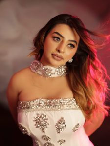 Ankita Dave's glamorous avatar in a white off-shoulder gown
