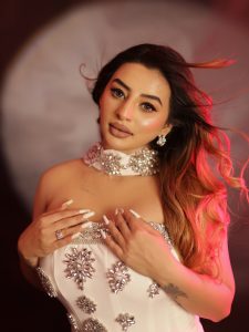 Ankita Dave's glamorous avatar in a white off-shoulder gown