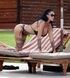 Katie Price squeezes into a barely-there black bikini 26 Katie Price squeezes into a barely-there black bikini