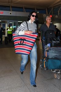 The Art of the Grand Exit: Dua Lipa Turns the JFK Terminal into a Runway