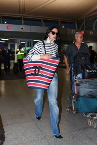 The Art of the Grand Exit: Dua Lipa Turns the JFK Terminal into a Runway