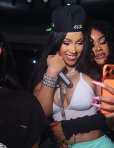 Cardi B turns heads in a plunging white top