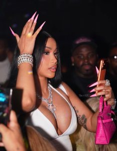 Cardi B turns heads in a plunging white top
