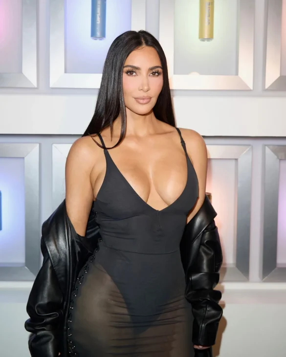 Kim Kardashian in a Sheer Black Dress and Leather Coat Leaves the UpDate Pop-Up on Melrose