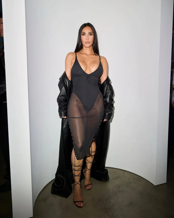 Kim Kardashian in a Sheer Black Dress and Leather Coat Leaves the UpDate Pop-Up on Melrose