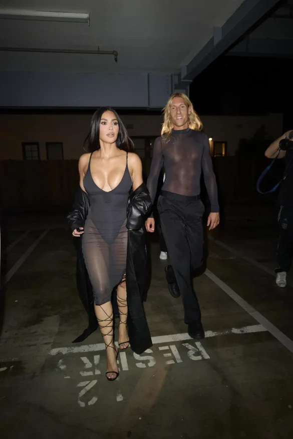 Kim Kardashian in a Sheer Black Dress and Leather Coat Leaves the UpDate Pop-Up on Melrose