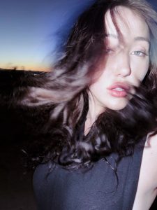 Noah Cyrus Goes Braless in a Daring Thong Bodysuit and Sheer Tights for a Desert Photo Shoot