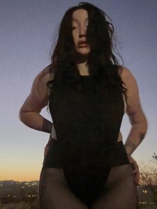 Noah Cyrus Goes Braless in a Daring Thong Bodysuit and Sheer Tights for a Desert Photo Shoot