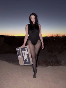 Noah Cyrus Goes Braless in a Daring Thong Bodysuit and Sheer Tights for a Desert Photo Shoot
