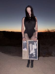 Noah Cyrus Goes Braless in a Daring Thong Bodysuit and Sheer Tights for a Desert Photo Shoot