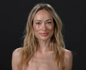 Olivia Wilde Wears a Strapless Peplum Top at The Invite Photocall