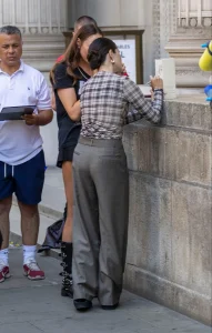 Selena Gomez Plaid Top Meets the Fuller Scale of Pleated Grey Trousers