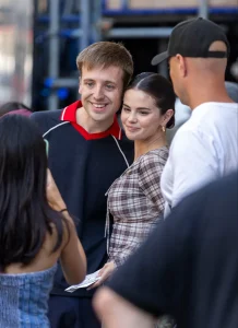 Selena Gomez Plaid Top Meets the Fuller Scale of Pleated Grey Trousers