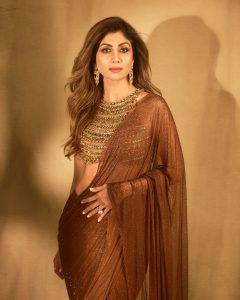Shilpa Shetty Kundra’s chocolate brown sari came with a necklace built into the blouse