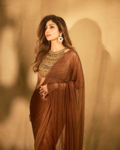 Shilpa Shetty Kundra’s chocolate brown sari came with a necklace built into the blouse